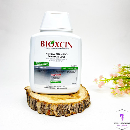 شامپو گیاهی ضد ریزش مو بیوکسین برای تقویت مو و کاهش ریزش با فرمول گیاهی