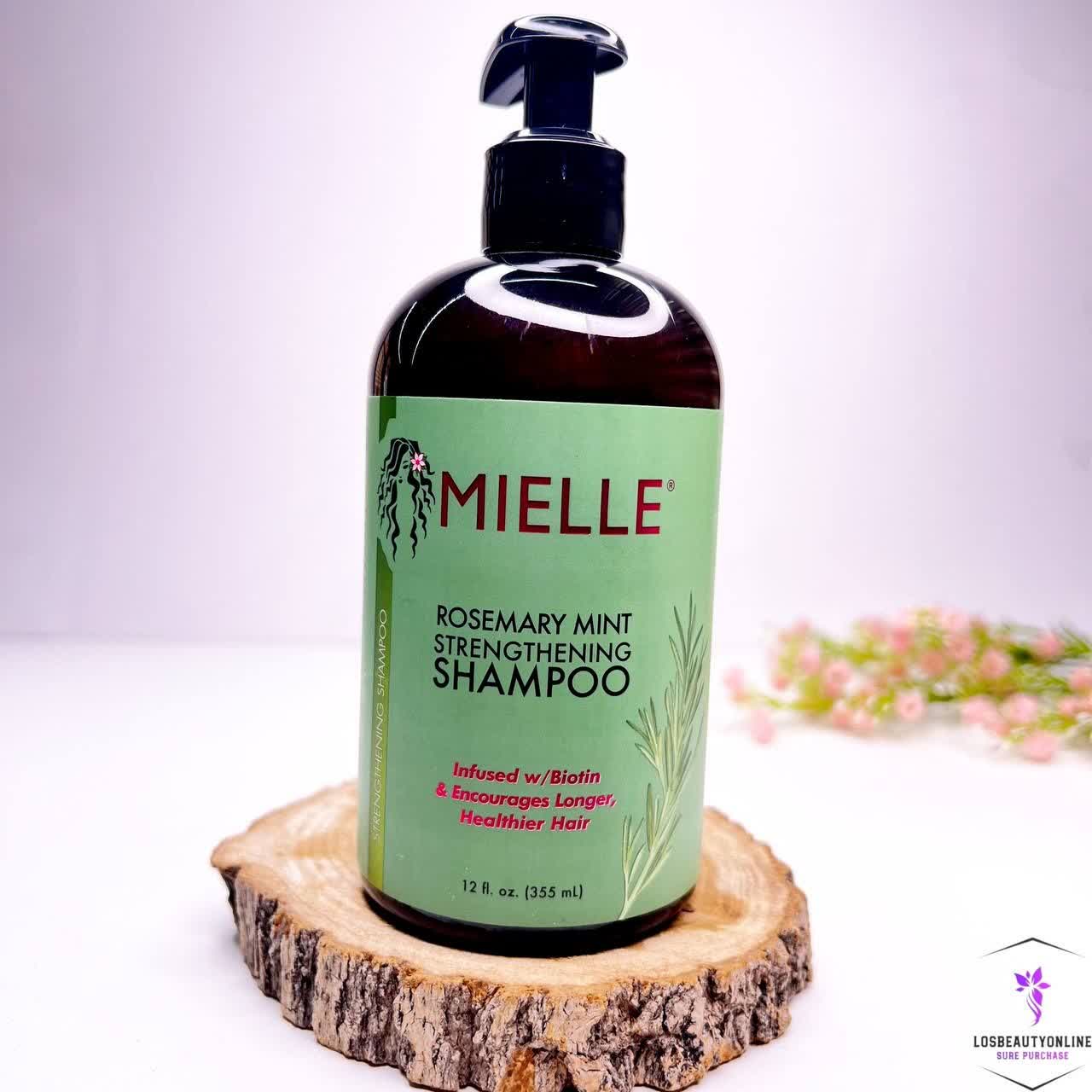 شامپو تقویت‌کننده رزماری و نعناع میله (Mielle) حاوی بیوتین
